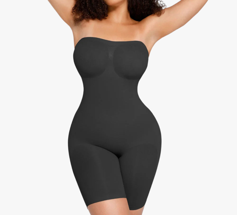 Black shapewear garment worn by a model on a white background